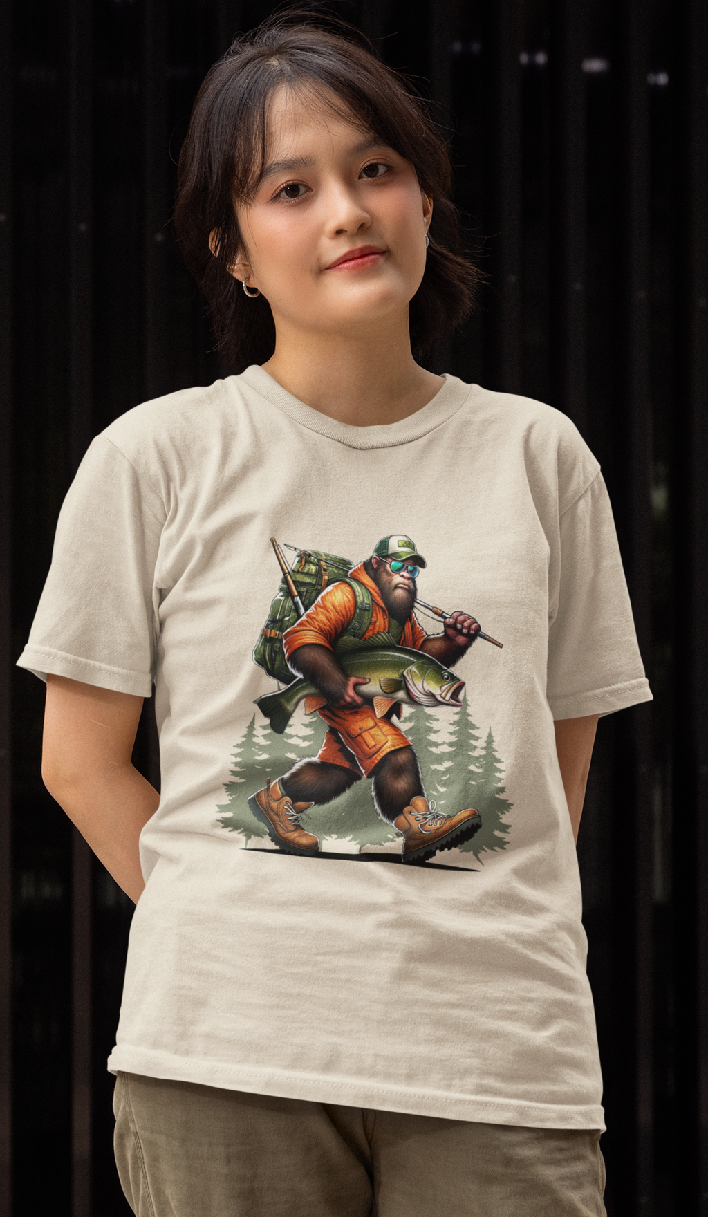 Fishing Bigfoot Carrying Fish T-Shirt (Tan)