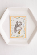 B - Letter Charm