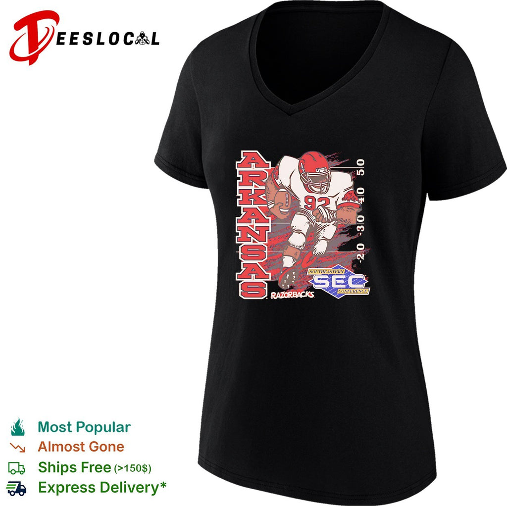 Arkansas Razorbacks football player number 92 running SEC conference shirt