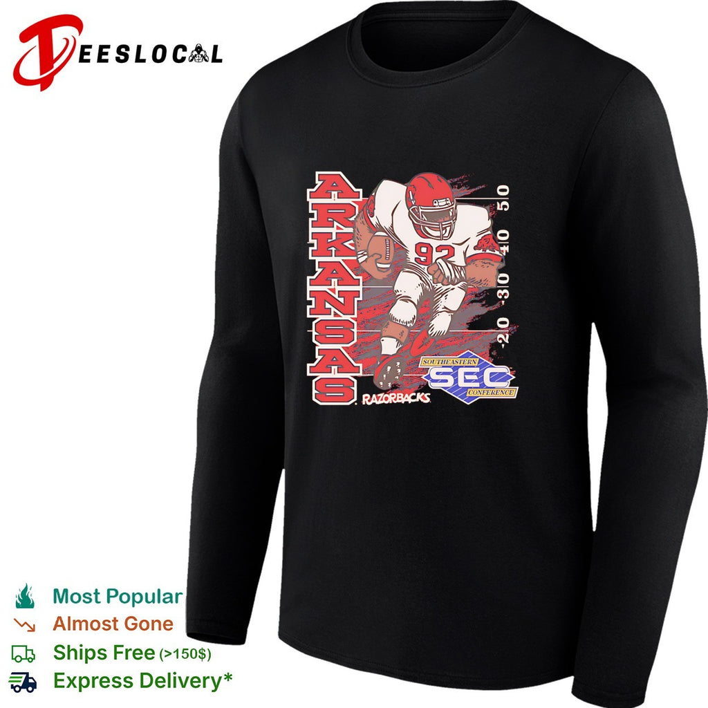 Arkansas Razorbacks football player number 92 running SEC conference shirt