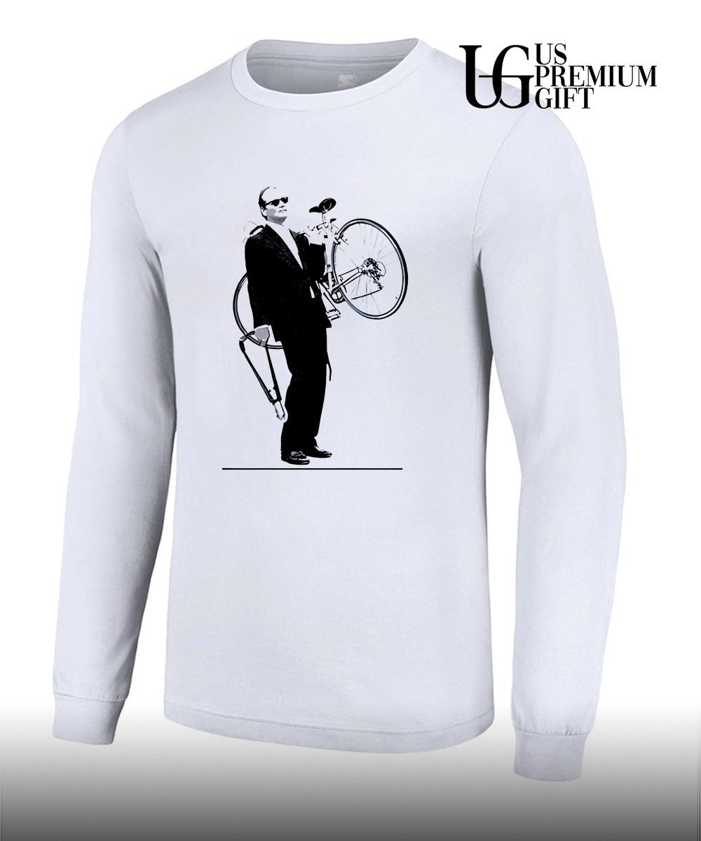 Bill Murray carrying a bicycle in Rushmore shirt