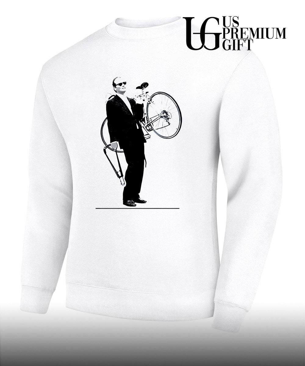 Bill Murray carrying a bicycle in Rushmore shirt