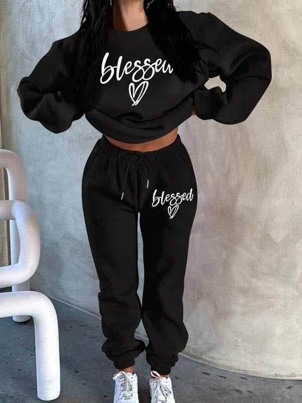 "Blessed" Graphic Tracksuit 2-Piece Set | Black Oversized Crop Sweatshirt & Sweatpants with Religious Slogan Print | Trendy Streetwear Outfit | Comfortable & Stylish | Casual Sportswear