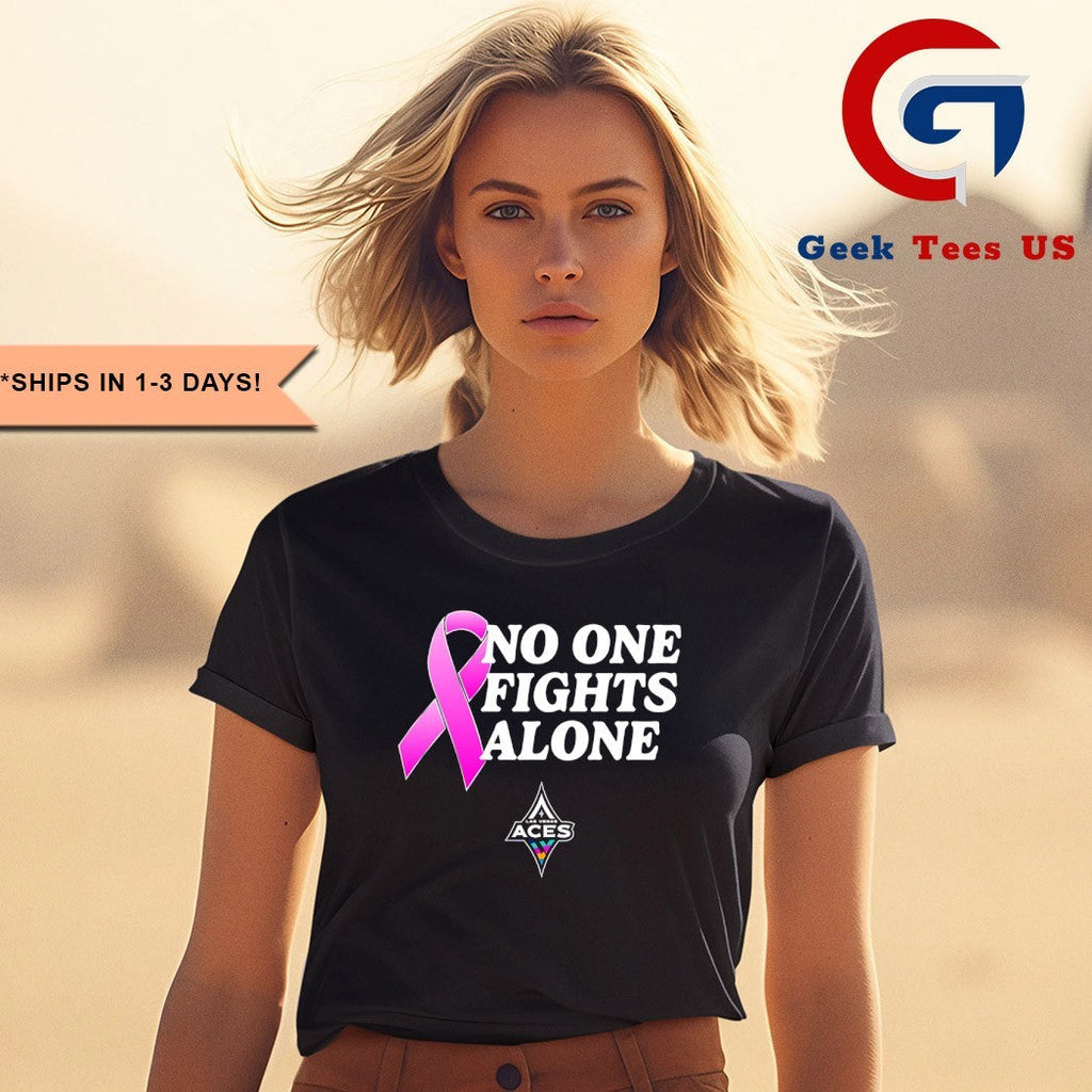 Chelsea Gray wearing No One Fights Alone United for a Cure Las Vegas Aces shirt