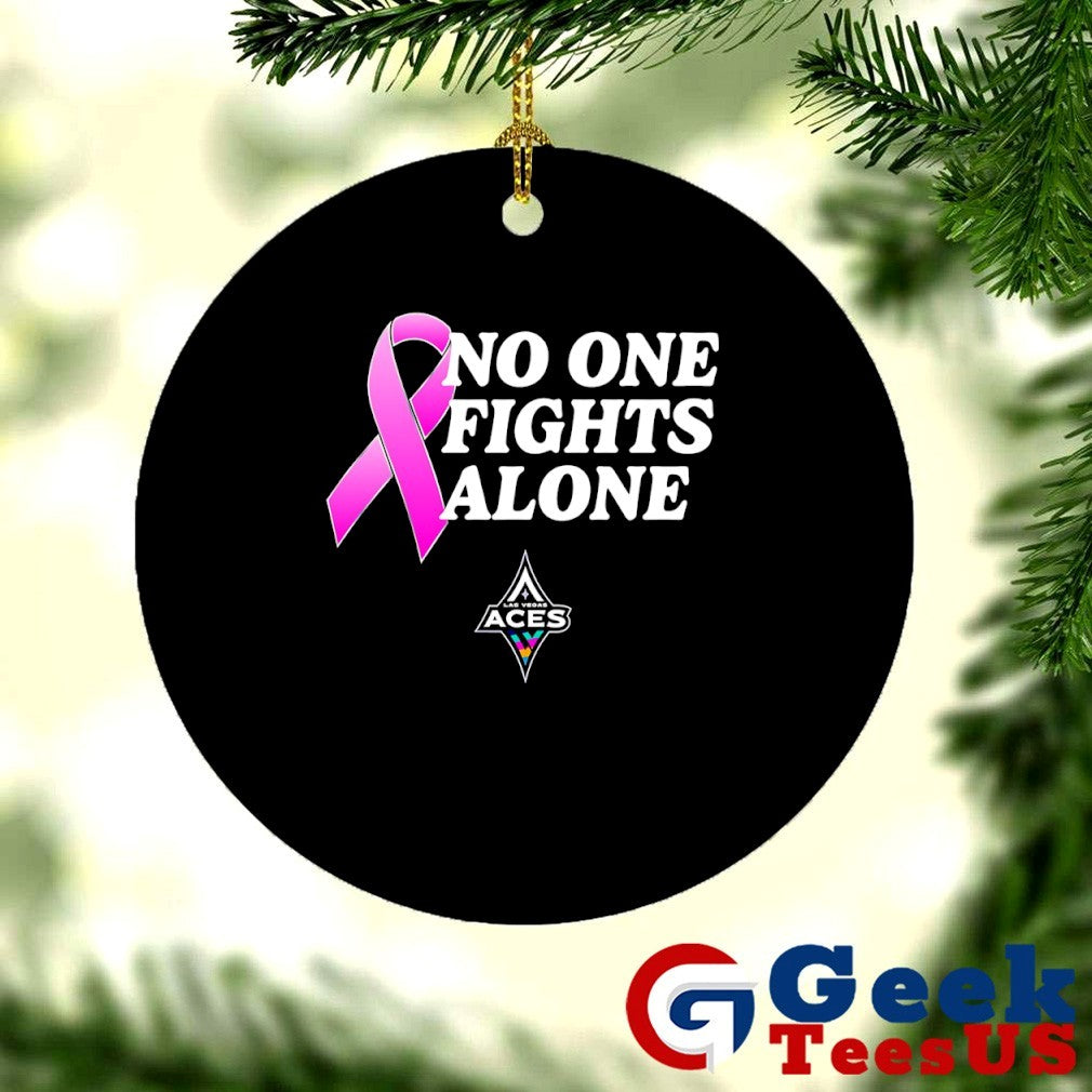 Chelsea Gray wearing No One Fights Alone United for a Cure Las Vegas Aces shirt