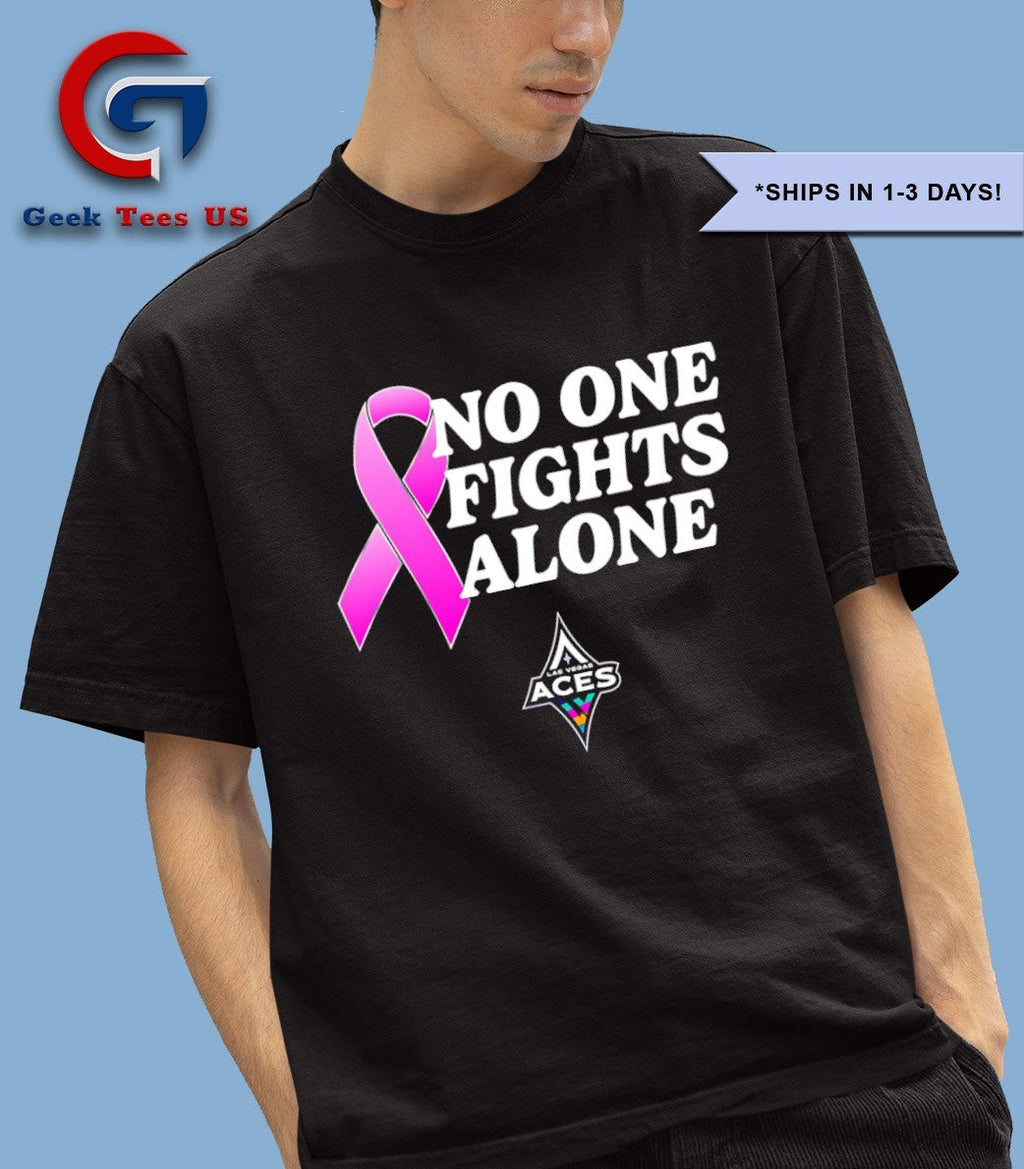 Chelsea Gray wearing No One Fights Alone United for a Cure Las Vegas Aces shirt