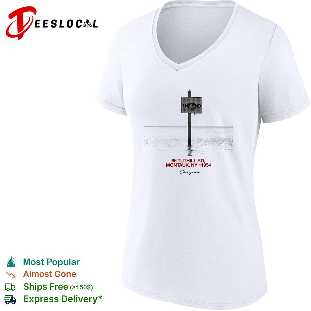 Duryea’s the end sign standing alone in Montauk ocean water black and white shirt