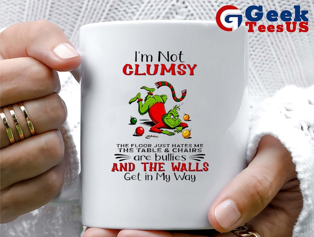 Grinch I’m not clumsy the floor just hates me the table and chairs are bullies Christmas shirt