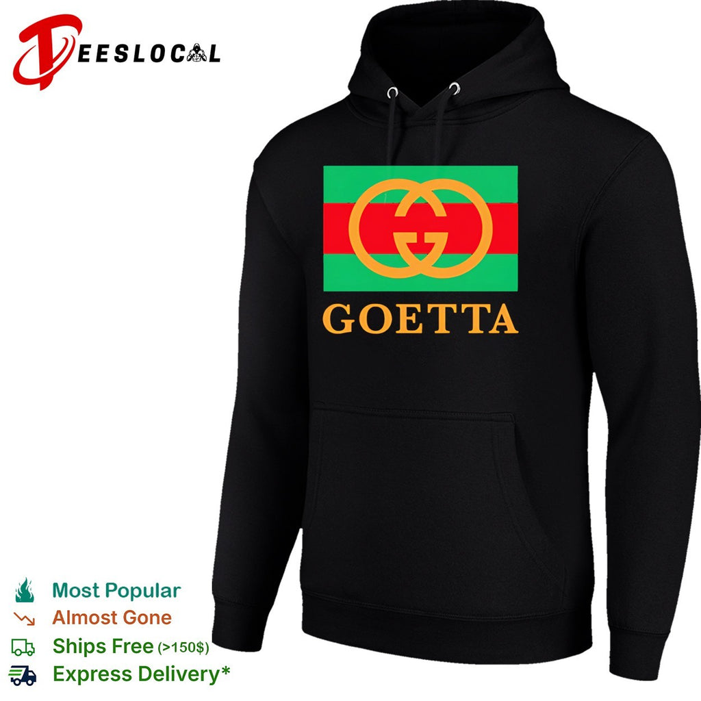 Interlocking rings logo on striped flag background reading goetta parody shirt