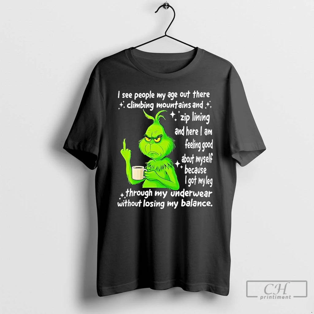 Premium Grinch I See People My Age Out There Climbing Mountains And Zip Lining And