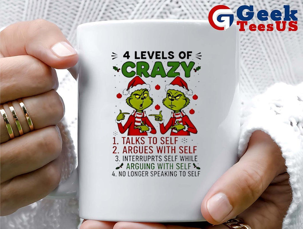 Santa hat Grinch 4 levels of crazy talks to self argues with self interrupts self while Merry Christmas shirt
