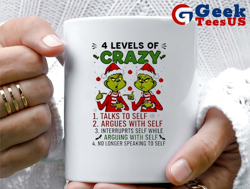 Santa hat Grinch 4 levels of crazy talks to self argues with self interrupts self while Merry Christmas shirt