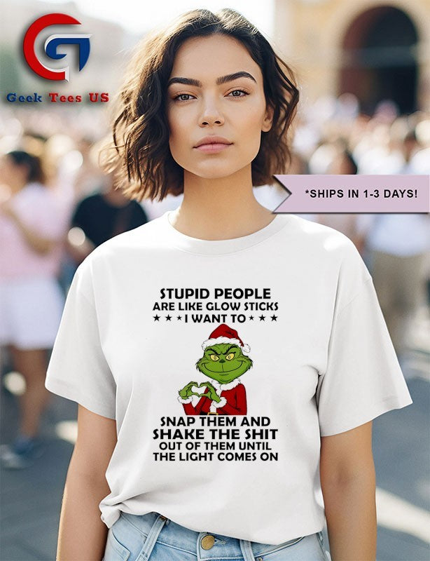 Santa hat Grinch stupid people are like glow sticks I want to snap them Christmas shirt