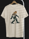 Bigfoot Silhouette with Trees & Mountains T-Shirt (Tan)