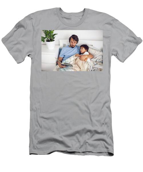 Dad Reads A Book Lying In White Bed To His Son Child Before Going To Bed T-Shirt