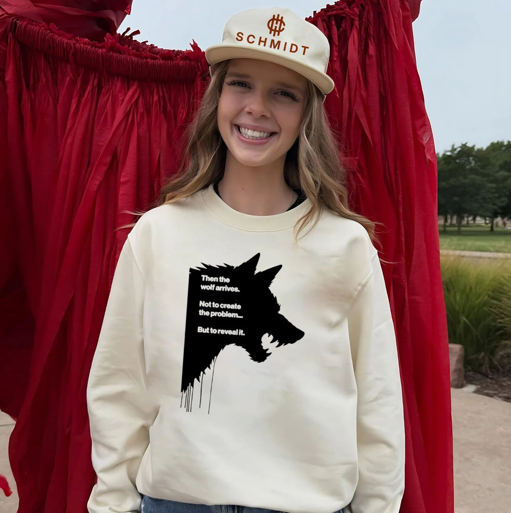 Then the wolf arrives not to create the problem but to reveal it shirt
