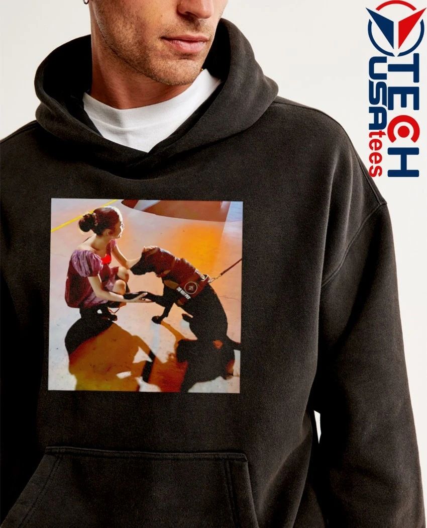Ariana Grande slipping down with dog photo shirt